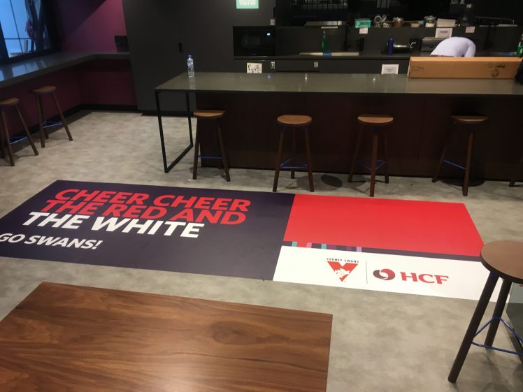 Cheer Cheer the Red and the White! Floor Graphics get your point across.
